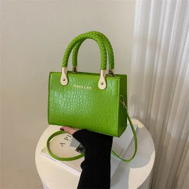 Sac à main vert croco tendance avec poignées tressées et chaîne réglable