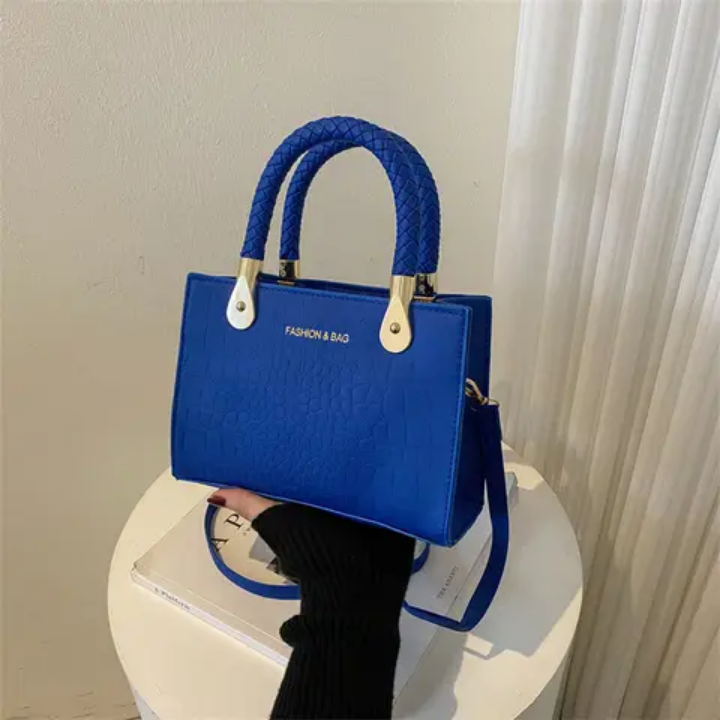 Sac à main vert croco tendance avec poignées tressées et chaîne réglable