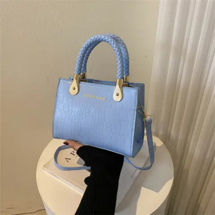 Sac à main vert croco tendance avec poignées tressées et chaîne réglable