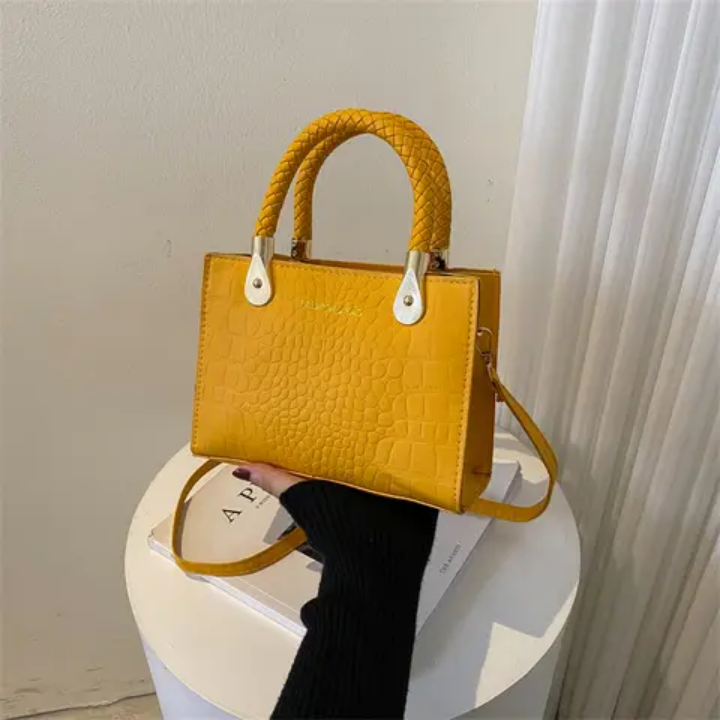 Sac à main vert croco tendance avec poignées tressées et chaîne réglable