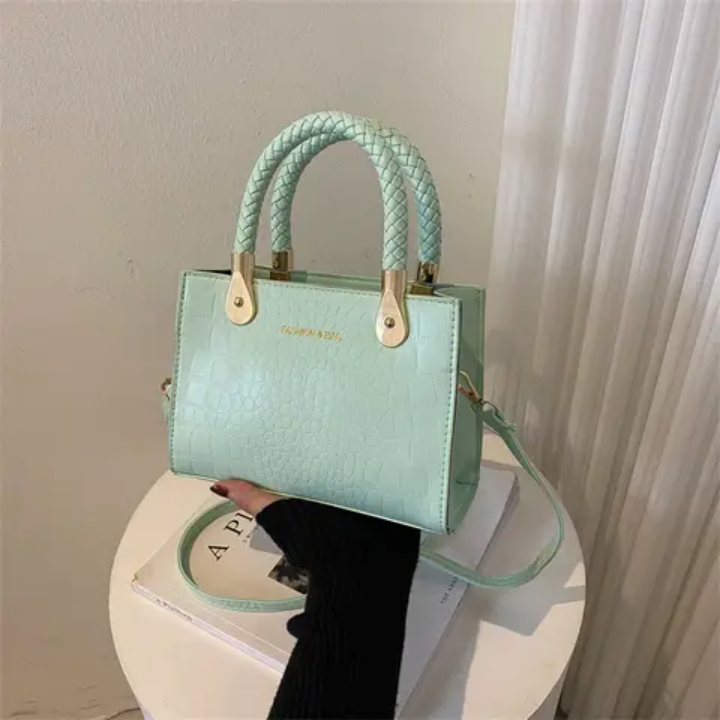 Sac à main vert croco tendance avec poignées tressées et chaîne réglable